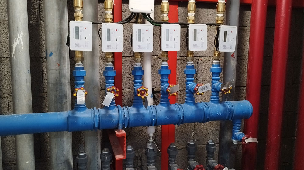 Bruntab ultrasonic smart water meters installed on a building riser